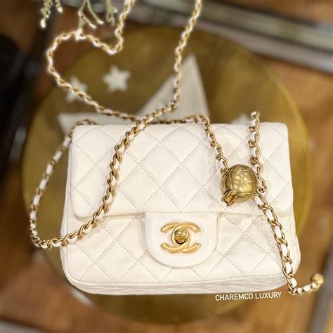 white chanel purse pearl|chanel 22 bag small price.